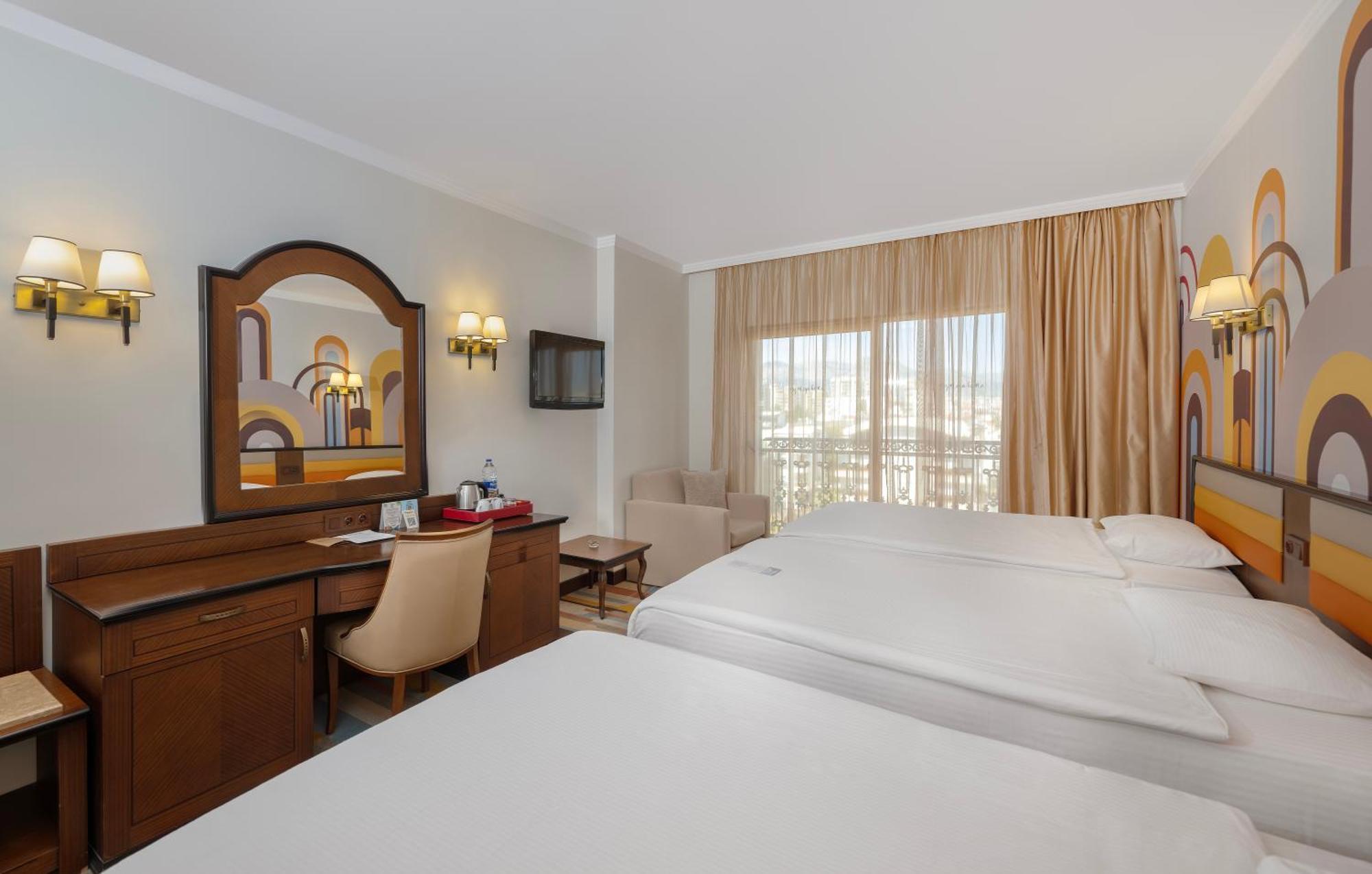 Megasaray Westbeach Antalya Kültér fotó A room at the hotel
